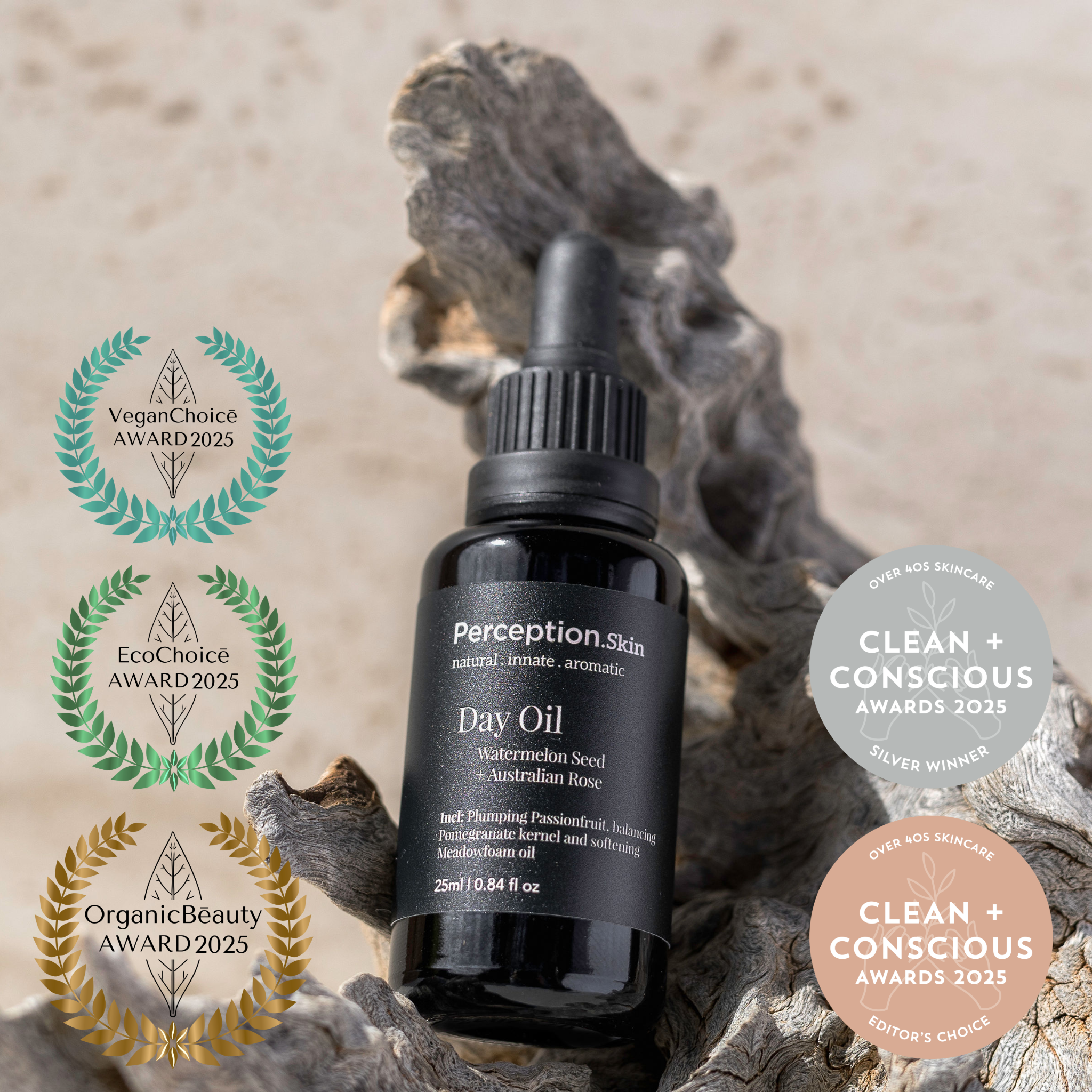 Perception Skin Watermelon Seed + Australian Rose Day Oil bottle with Organic Beauty Awards 2025 awards on a natural background