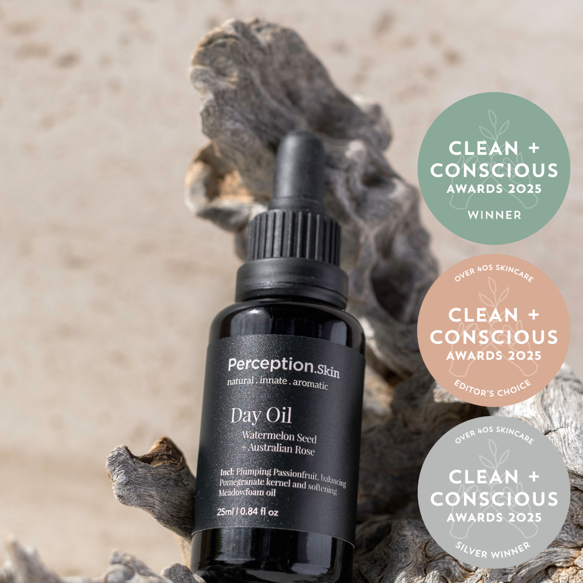 Perception Skin Day Oil Watermelon Seed + Australian Rose bottle with 'Clean + Conscious' awards on a natural background